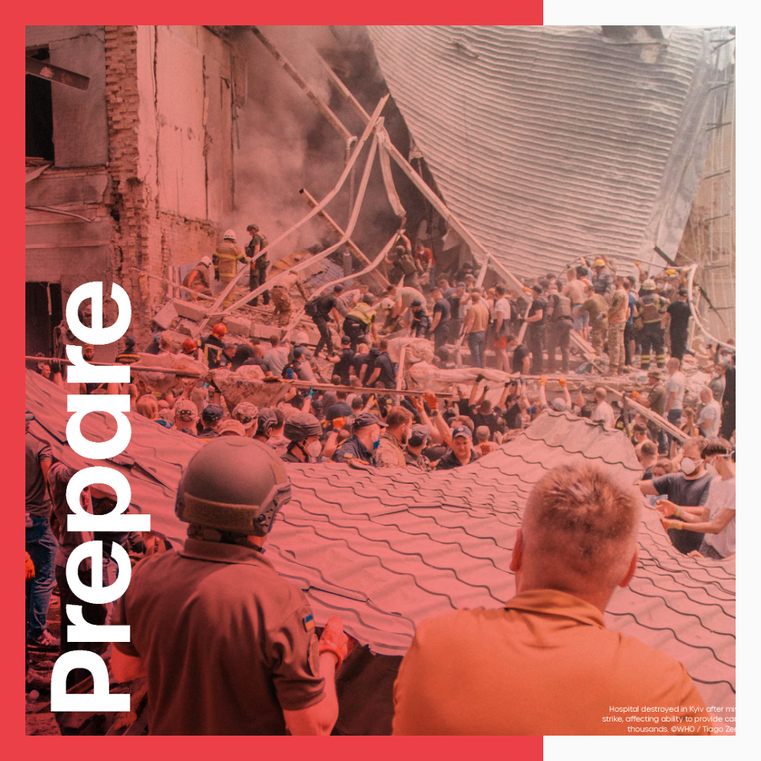 Emergency workers rescue people from a destroyed hospital in Ukraine