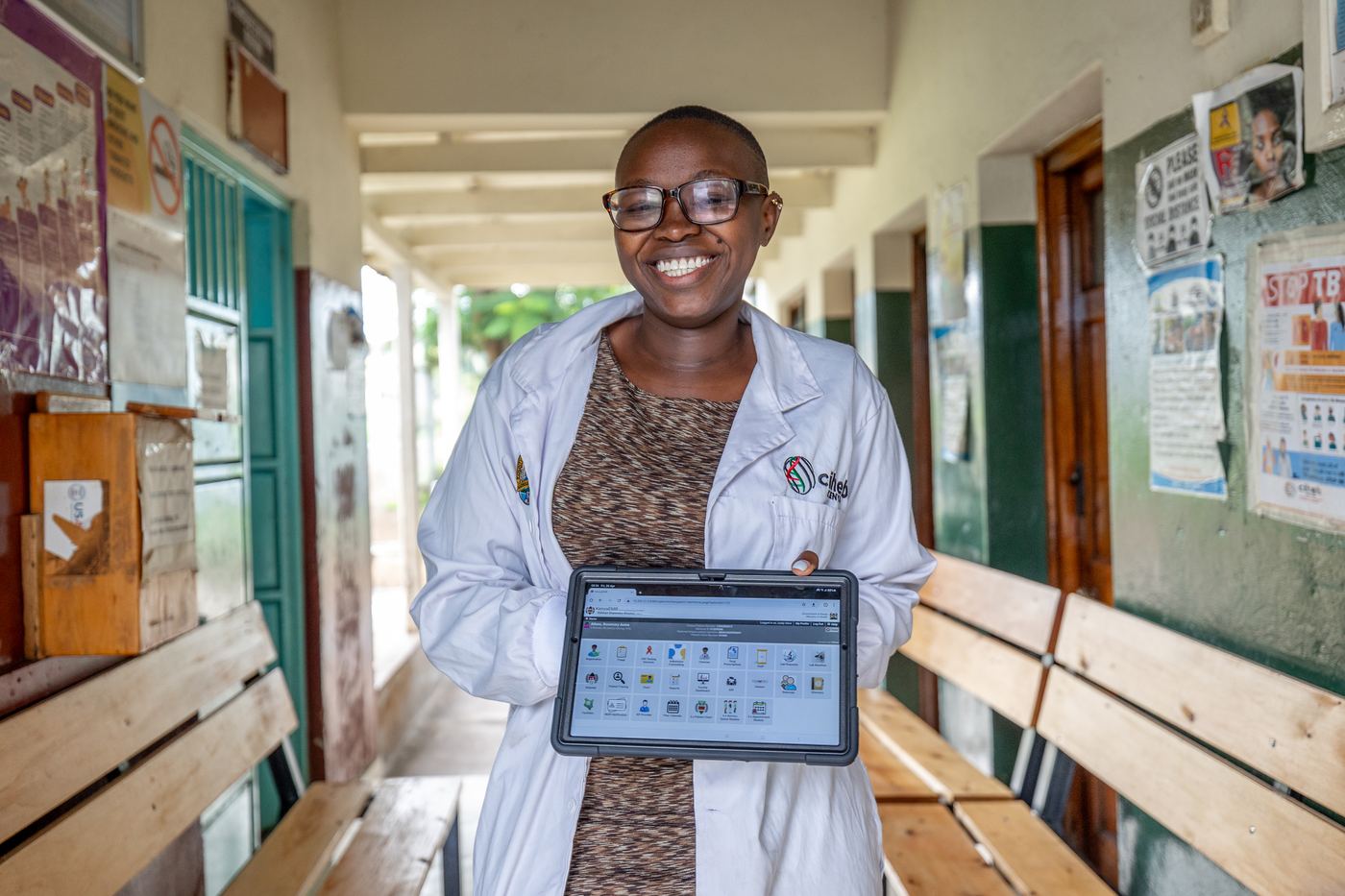 Data manager Flavia Naudi holds a tablet used to record digital data, Railways Health Clinic, Kisumu County, Kenya.
